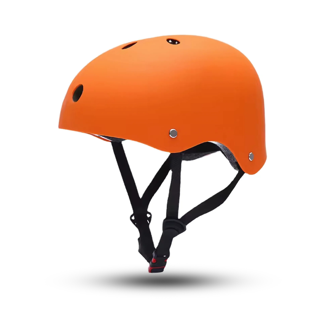 A orange safety skate helmet for kids with ventilation holes and an adjustable chin strap