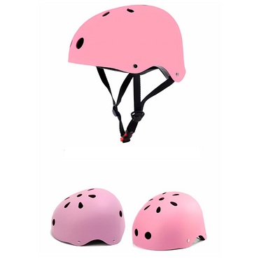 A pink safety skate helmet for kids with ventilation holes and an adjustable chin strap