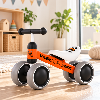 	Orange mini balance bike for toddlers on a timber floor in a bright playroom